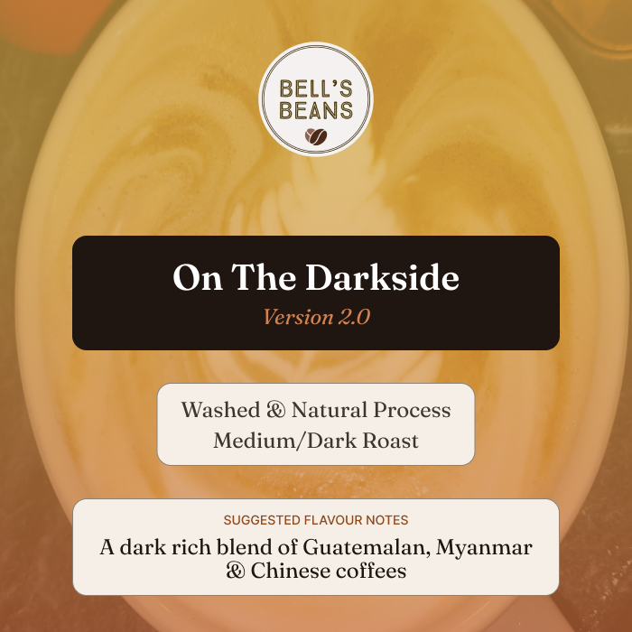 Coffee package labeled 'On The Darkside' by Bell's Beans with coffee bean design.