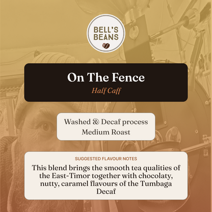 Tea packaging for 'On The Fence' half-caff blend by Bell's Beans with vintage illustration in the background.