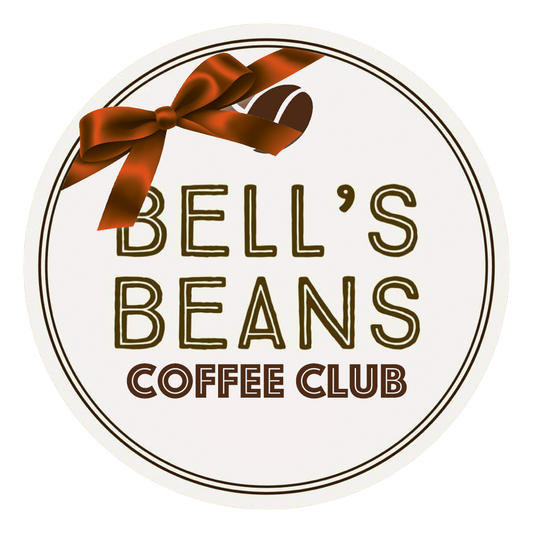 Logo for Bell's Beans Coffee Club with a brown bow and coffee bean on a white background